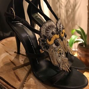 Elegant Giuseppe Zanotti sandals with bird design